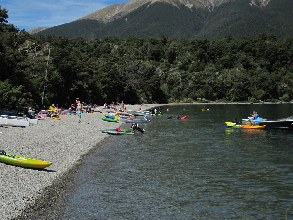 kayaks on the shore of Lake Rotoiti
