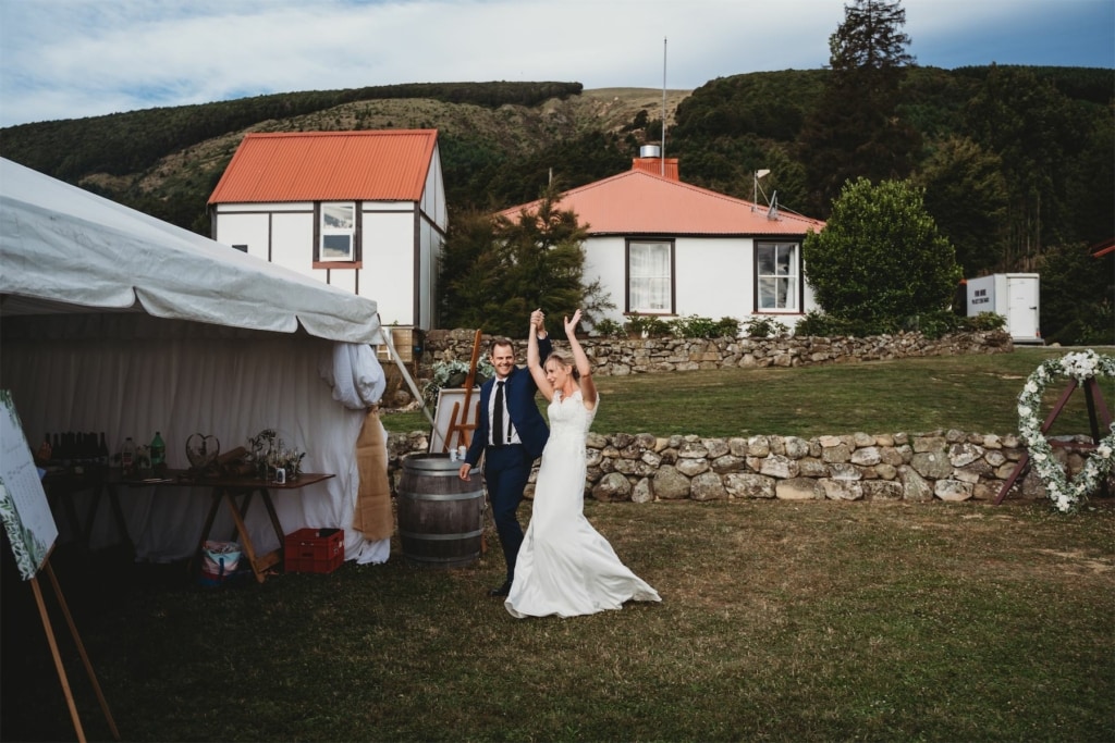 Bride and groom celebrating at Tophouse Historic Inn's Wedding venue
